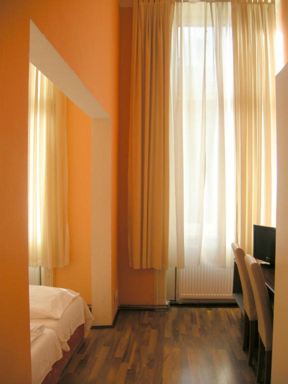 Pension Schottentor Виена Стая снимка